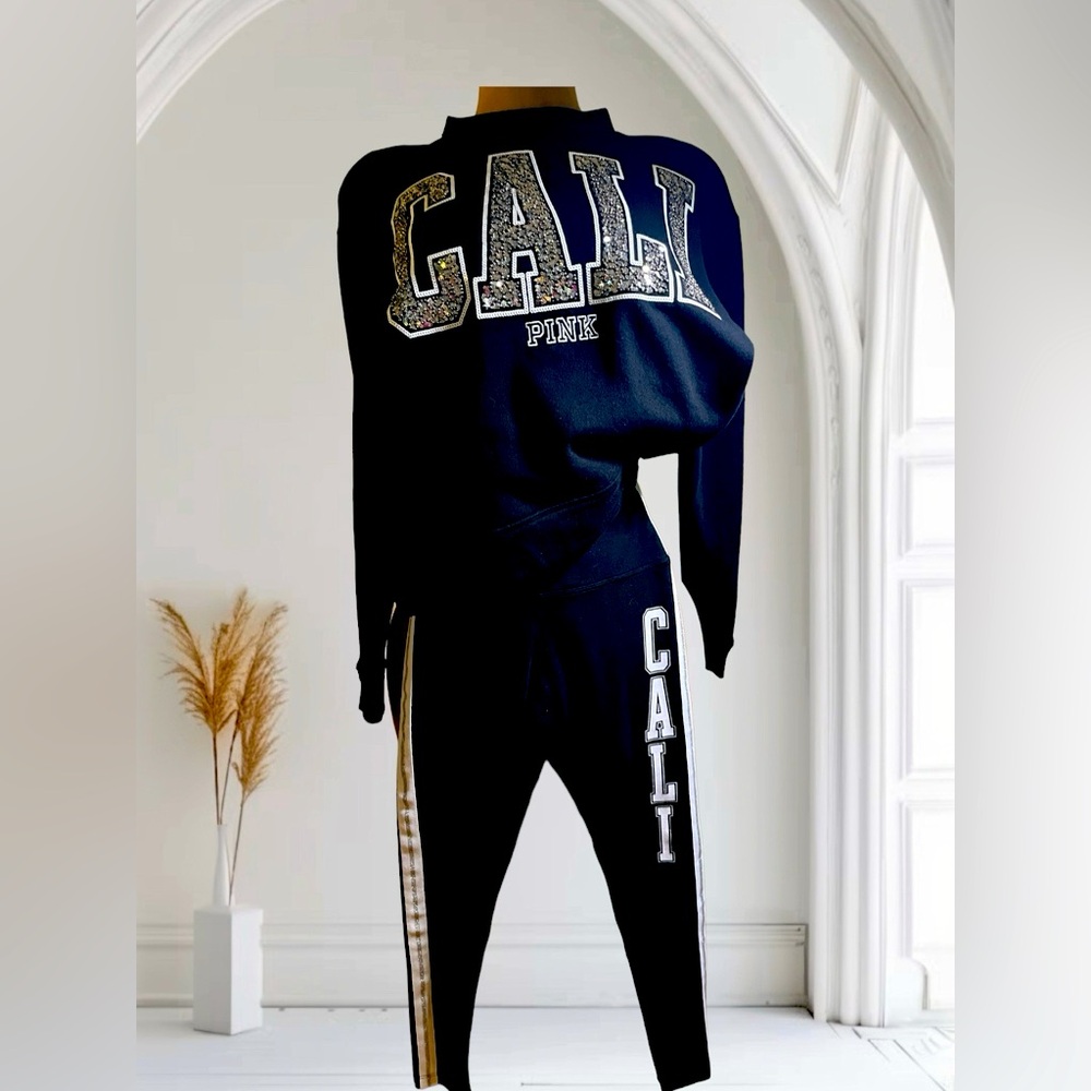 NWOT sold out VS PINK “Cali” Sweatshirt Size XSmall. Black w/ silver lettering.